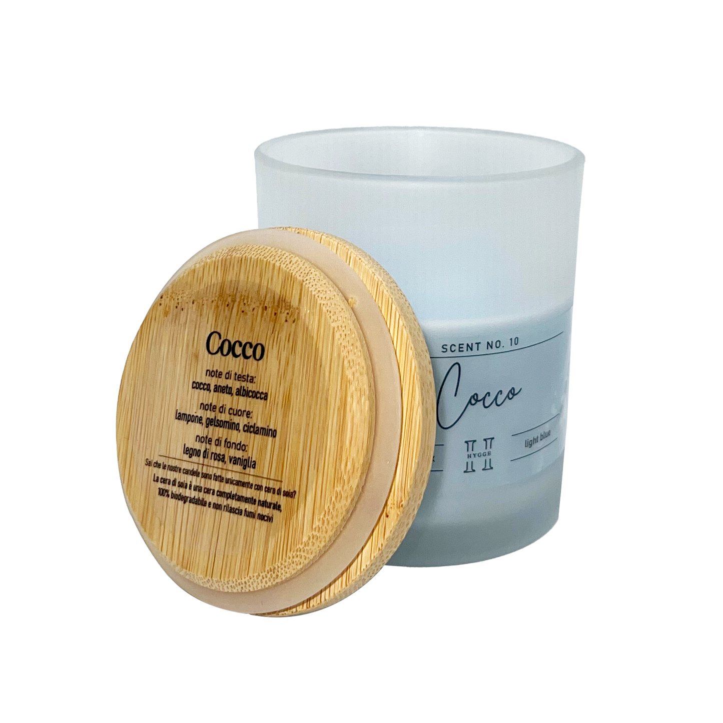 candela profumata celeste al profumo di cocco, dettaglio del tappo in legno con descrizione note olfattive