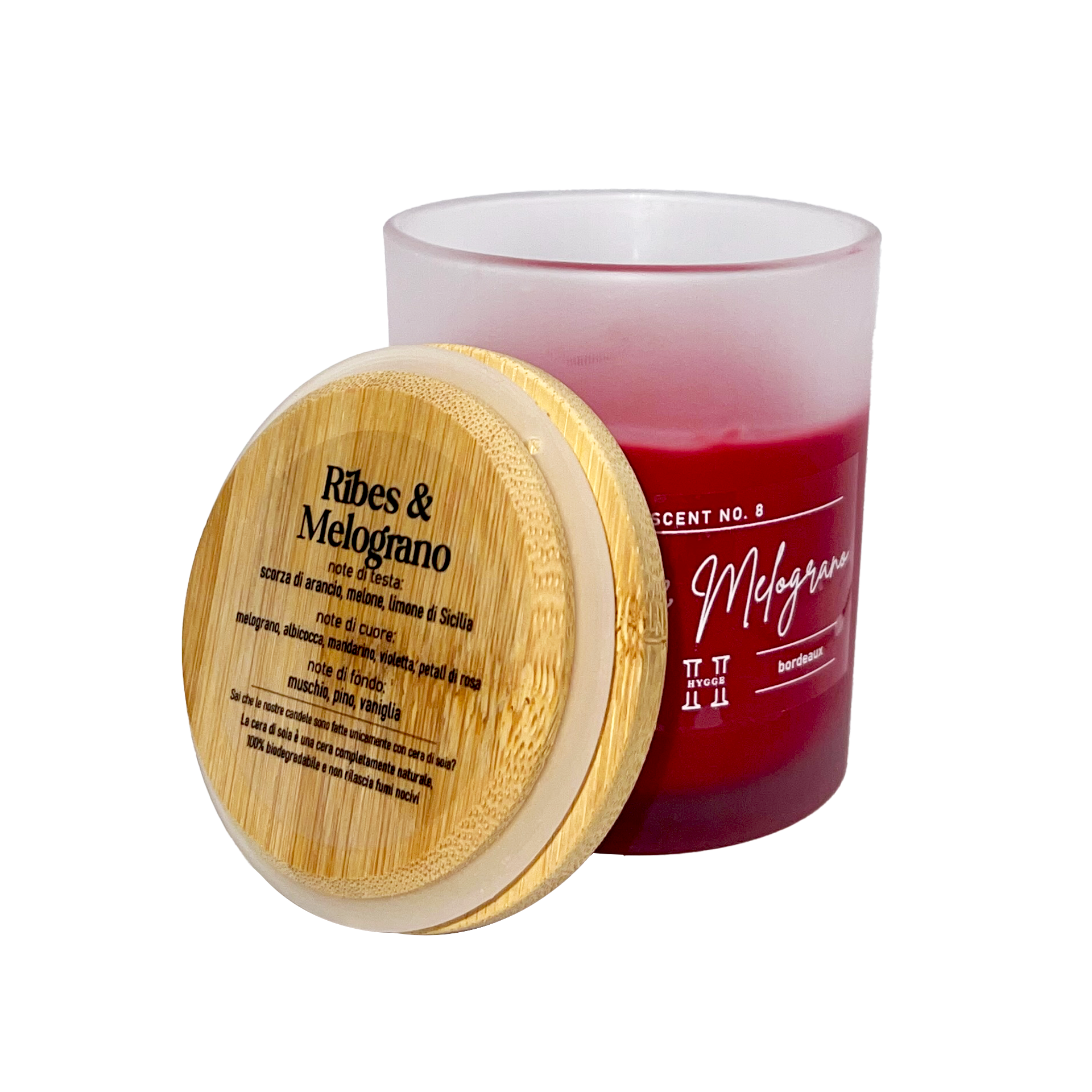 candela profumata bordeaux al profumo di ribes e melograno, dettaglio del tappo in legno con descrizione note olfattive